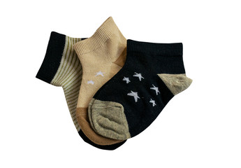 Three pairs of cotton socks. Striped pattern and star pattern. Children's socks. Cotton. Isolated item