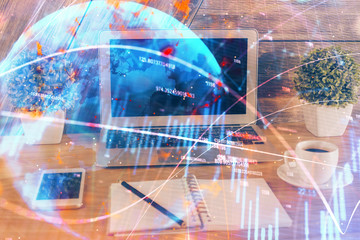 Multi exposure of chart and financial info and work space with computer background. Concept of international online trading.