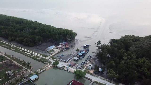 Aerial view Malays fishing village in evening at Sungai Semilang, Juru, Penang, Malaysia.