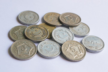 close up of pile of pakistani five rupee coins