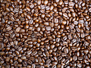close up of Roasted coffee beans isolated background, ready to give freshness and alongside the businessman