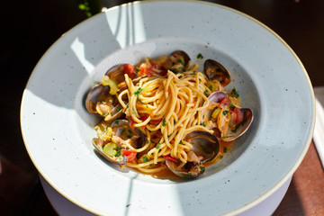 spaghetti with tomato sauce and basil