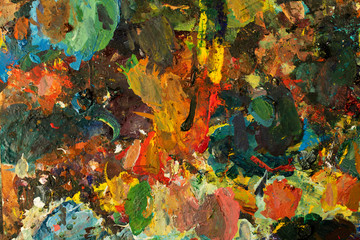 Fototapeta na wymiar Background image of bright oil-paint palette closeup.