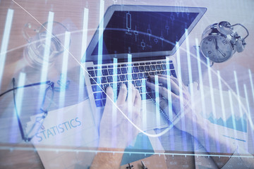 Multi exposure of forex graph with man working on computer on background. Concept of market analysis.
