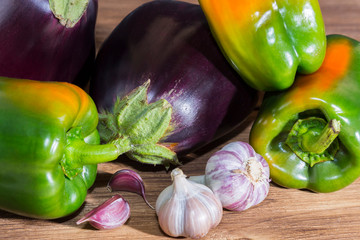 Harvest. Vegetarian food, raw food diet, assortment of diet products, various fresh raw vegetables, eggplant, green pepper garlic