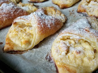 Puff pastry cheesecakes serve as a delicious sweetness for coffee or tea.
