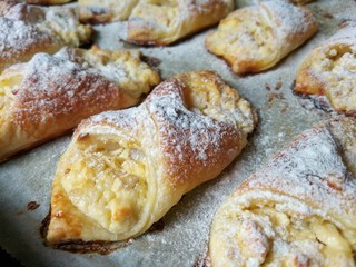 Puff pastry cheesecakes serve as a delicious sweetness for coffee or tea.