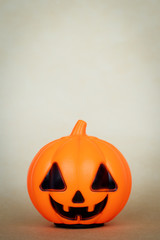 The toy pumpkin. Halloween symbol, holiday decoration. Celebration banner, frame. Text space. 