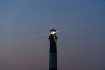 Fire Island lighthouse beacon cross star effect from beacon light shining over Robert Moses beach...