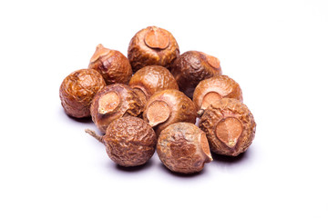 Group of soap nuts in isolated white background.