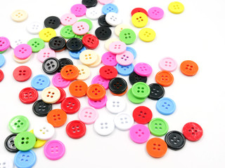 Multicolored buttons, isolated on a white background.