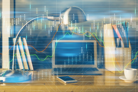 Double exposure of chart and financial info and work space with computer background. Concept of international online trading.