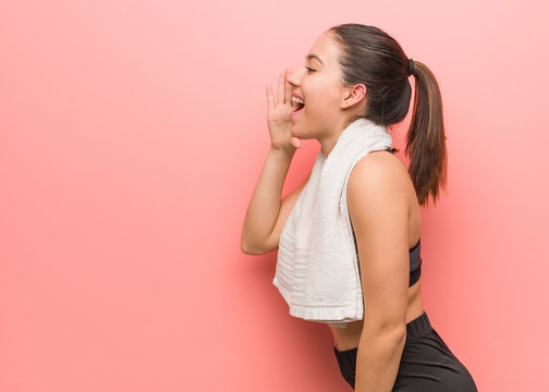 Young fitness woman whispering gossip undertone