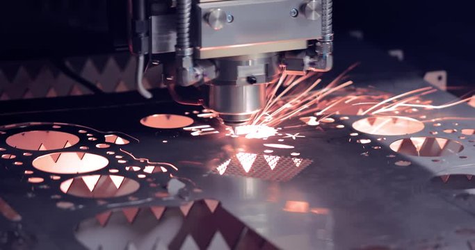 CNC Laser cutting of metal, modern industrial technology.