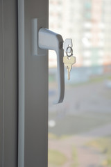 window handle with keys. the window in the room