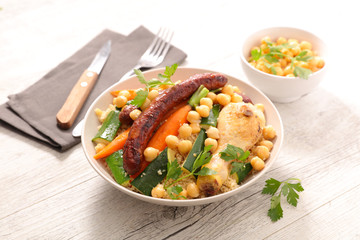 couscous with vegetable, sausage and chicken leg