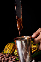 pouring beer into glass