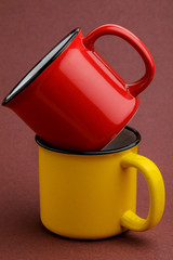 iron mug, on red background.