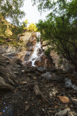 Fototapeta na wymiar Waterfall Shirlak in Altai Mountains , West Siberia, Russia