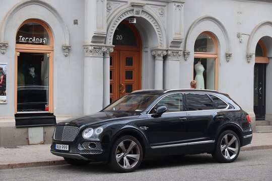 STOCKHOLM, SWEDEN - AUGUST 24, 2018: Bentley Bentayga luxury crossover SUV parked in Stockholm, Sweden. There are 4.8 million passenger cars registered in Sweden.