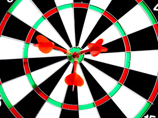 Target with three red dart focus on bull's eye, Setting challenging business goals And ready to...