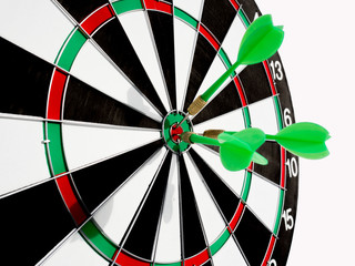 Target with three green dart focus on bull's eye, Setting challenging business goals And ready to achieve the goal with teamwork concept