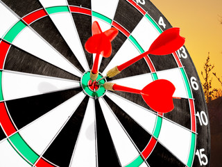 Target with red dart focus on bull's eye, Setting challenging business goals And ready to achieve...