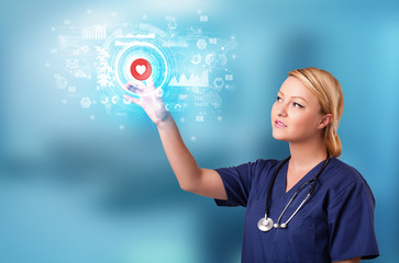 Doctor touching hologram screen displaying medical symbols and charts