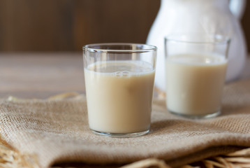 Oat milk in glasses. Alternative lactose free vegan friendly plant milk