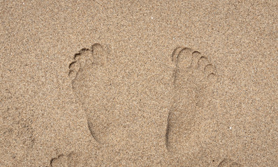 Fototapeta na wymiar Man left footprints in the sand