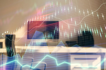 Stock market chart and desktop office computer background. Multi exposure. Concept of financial...