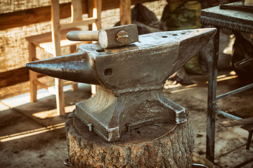 Anvil And Hammer Inside A Blacksmith Workshop