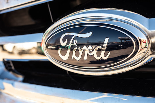 Valencia, Spain - January 13, 2019: Logo of the car manufacturer Ford in a parked vehicle.