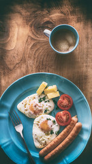 Delicious breakfast eggs and coffee on wooden table healthy morning snack