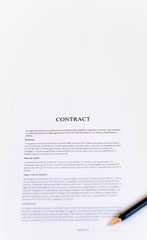 Fototapeta premium White table with document contract form paper and empty space to sign authorized signature, copy space available for text