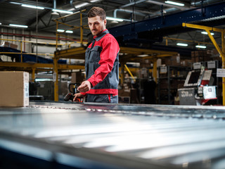 Warehouse worker working on a conveyor line