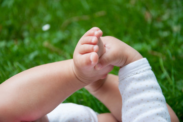 baby foot in the grass