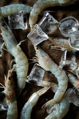 Raw skinned shrimps with ice 