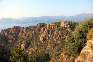 Red badlands on sunset in Corsica Island in France
