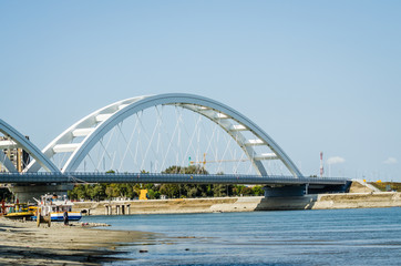 Naklejka premium Novi Sad, Serbia - July 17. 2019: Zezelj bridge on river Danube in Novi Sad Serbia. The prospect of built New Zezelj Bridge viewed from the Petrovaradin side of the promenade