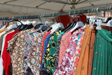 Stand of flea market with clothes