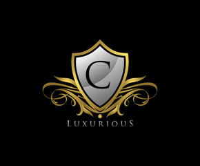 Obraz premium Luxury Gold Shield C Letter Logo Icon. Elegant C Letter Icon.