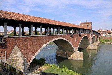 Old Bridge in Pavia in Italy and the Ticino River