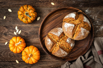 Obraz na płótnie Canvas Pumpkin bread. Homemade rye wholemeal yeast-free bread with pumpkins