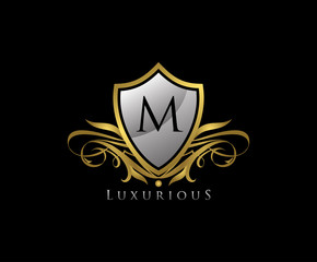 Luxury Gold Shield M Letter Logo Icon. Elegant M Letter Icon.