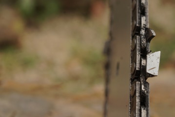 Close up of dirty chainsaw chain