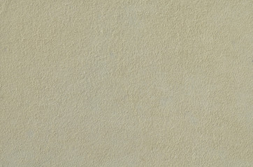 Grey suede soft leather for background. Natural texture of the suede. Space for text on the background of Shammy leather close-up. Faux suede made from polyester.