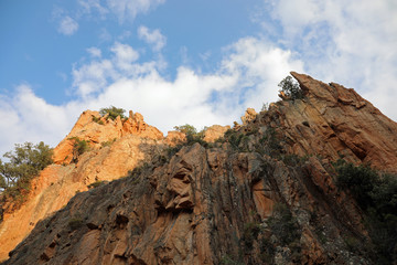 red rocks of the mountain called Les Calanches in french languag