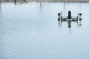 Many electric waterwheels work to increase oxygen content in water. Aquaculture in Taiwan.