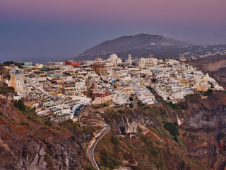 Fototapeta na wymiar Picturesque view of illuminated city on rock